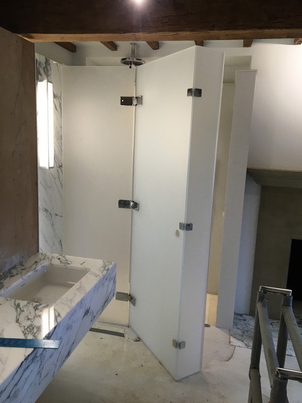 Bespoke frosted glass shower enclosure in Hackney luxury bathroom