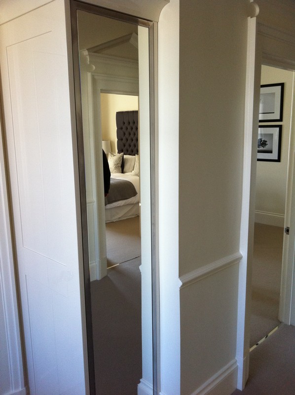 Full-length wardrobe mirror fitted in Hackney home